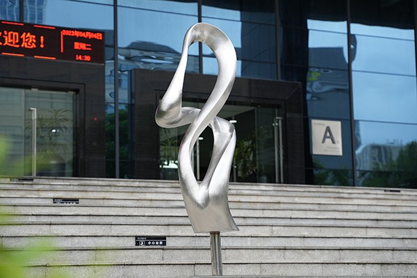 Abstract Brushed Stainless Steel Flowing Sculpture for Interior Spaces